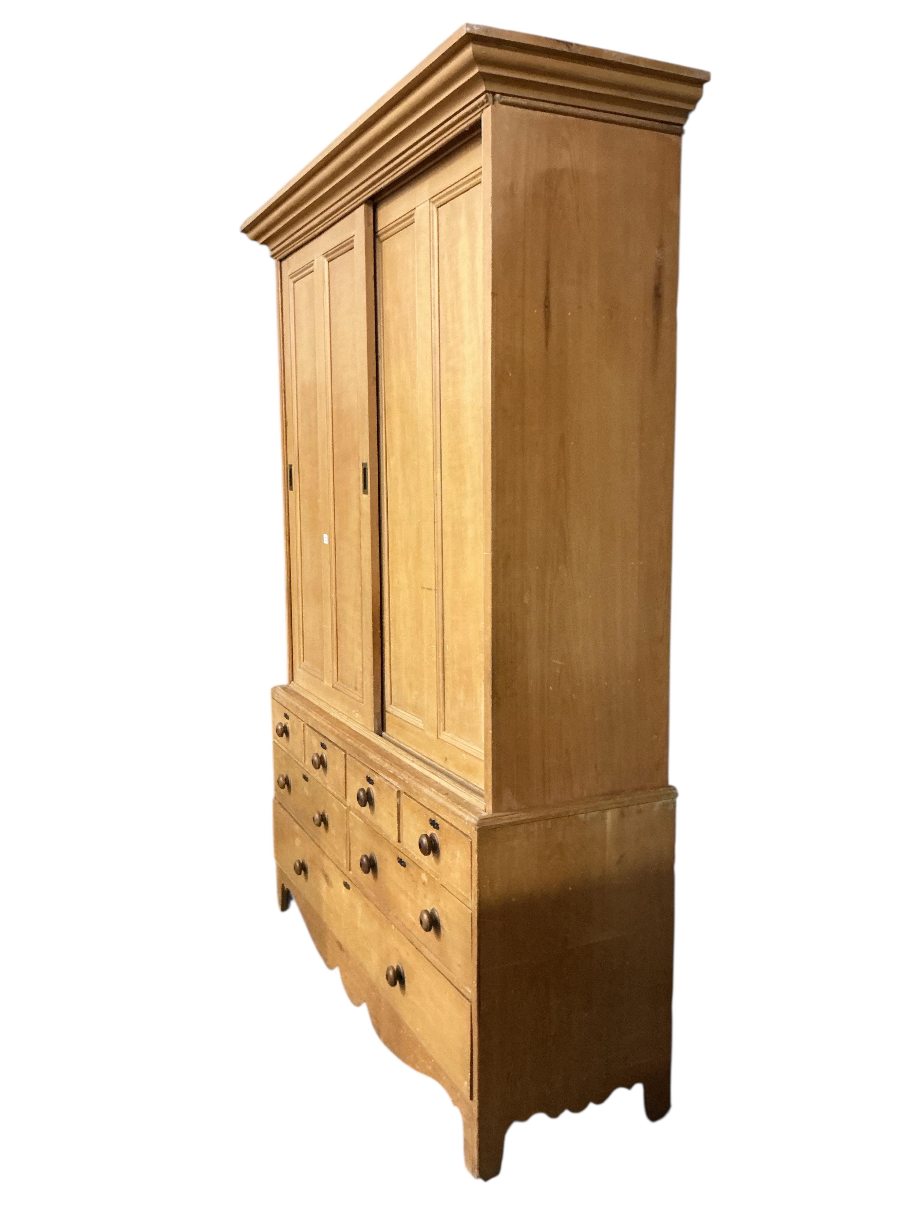A 19th century pine household cupboard, width 183cm, depth 60cm, height 270cm